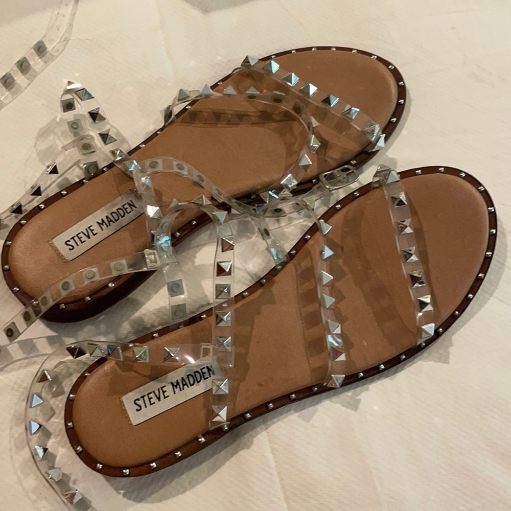 Steve Madden clear travel sandal. No studs missing